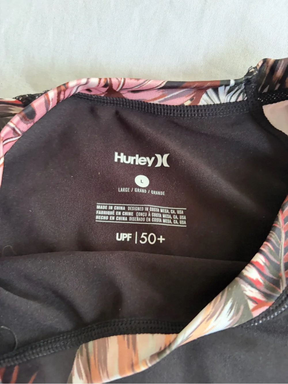 Hurley Womens Black Rash Guard with Pink Leaf-Print Sleeves